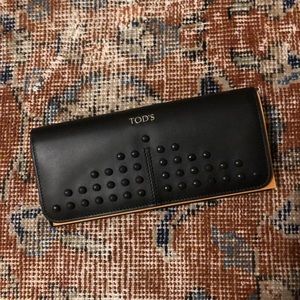 NWOT Tod’s black leather wallet, studs